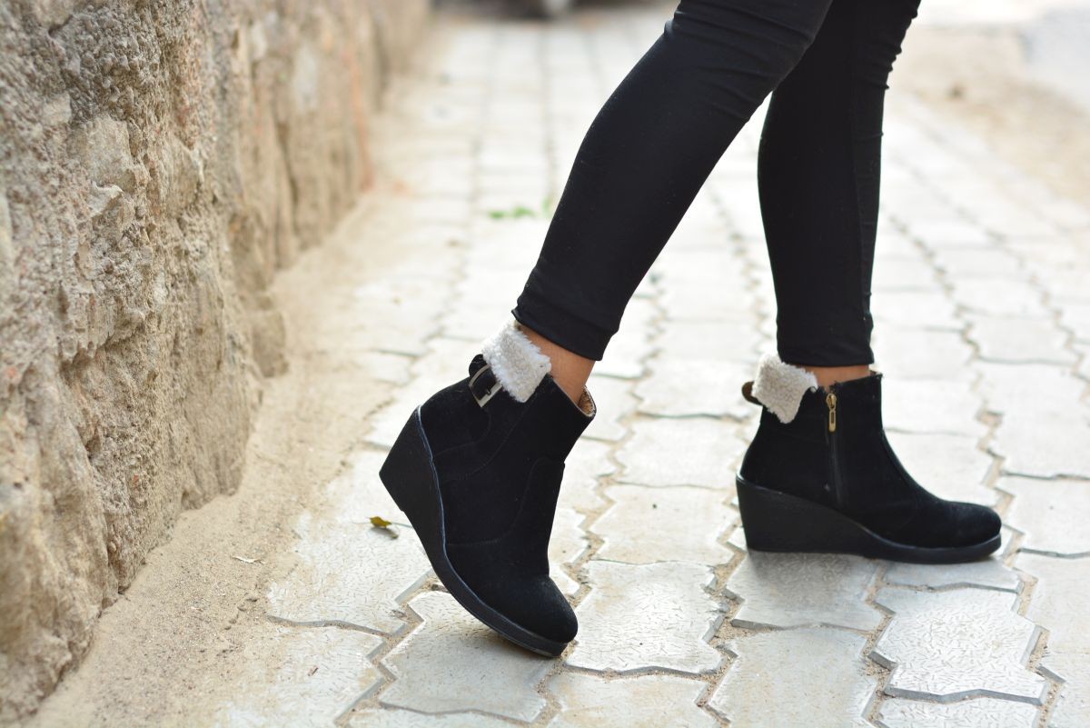 black heeled boots with fur trim