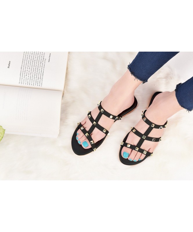 Flat black store studded sandals