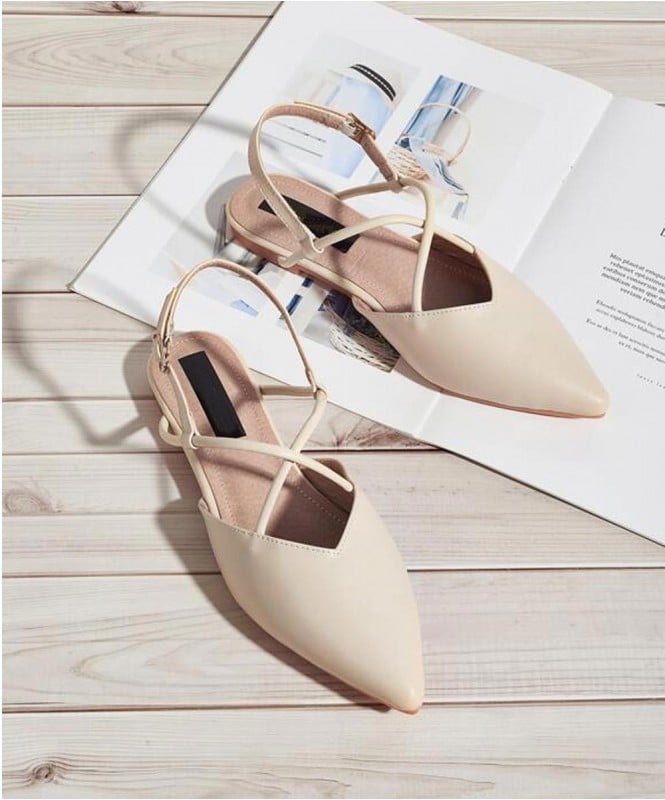 Naomi twisted mules Off White Flats