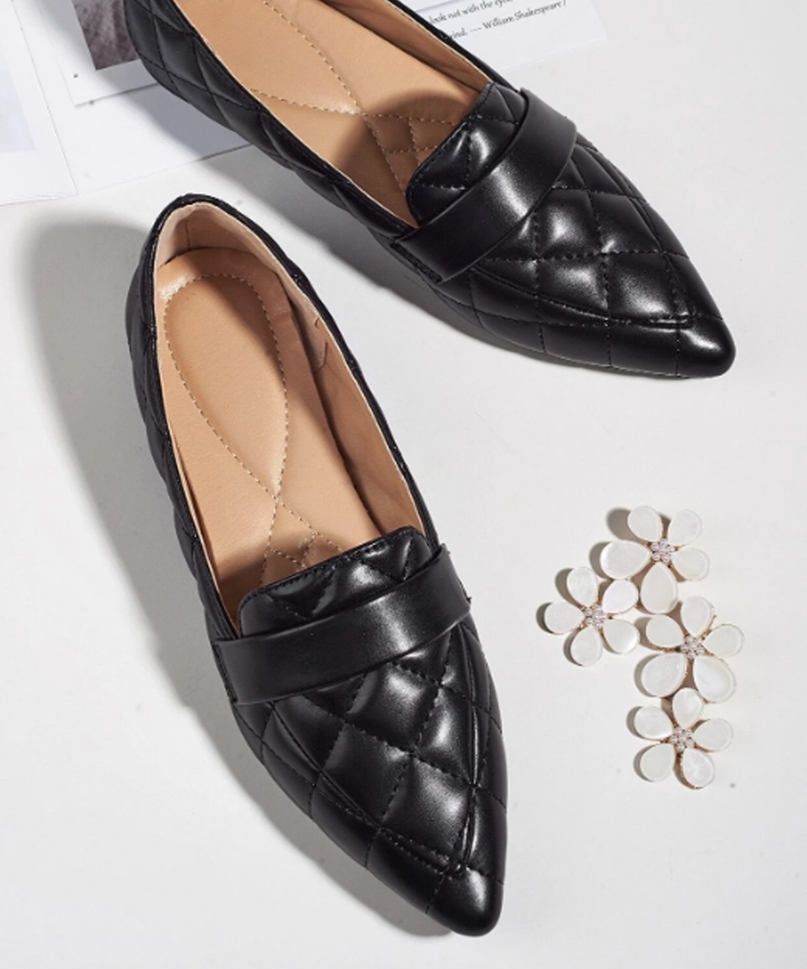 Black quilted ballet flats