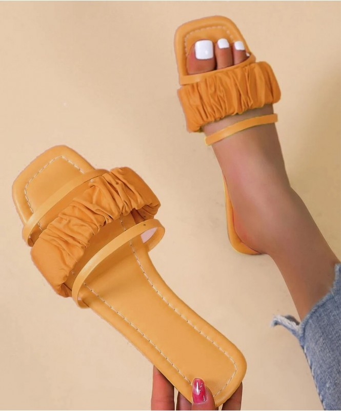 The mustard yellow scrunchie strap flats