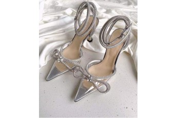 Transy silver shimmering bow heels
