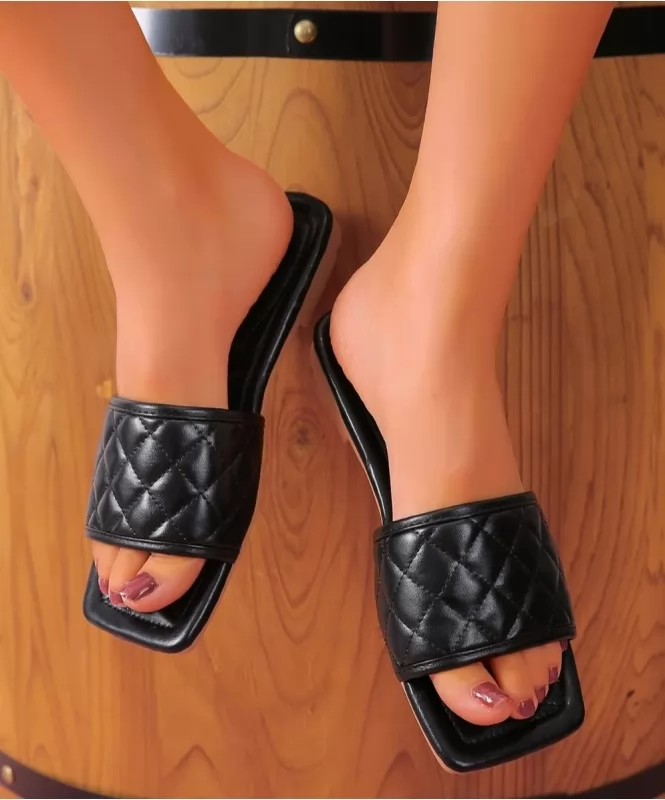 Black quilted simple flats
