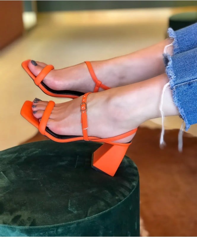 The tangy orange strappy heels