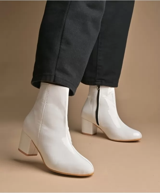 Patent white ankle boots