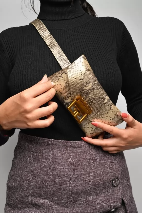 The chic gold belt bag with sling