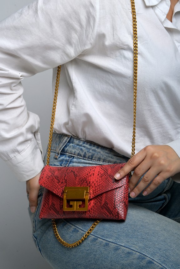 The chic red belt bag with sling
