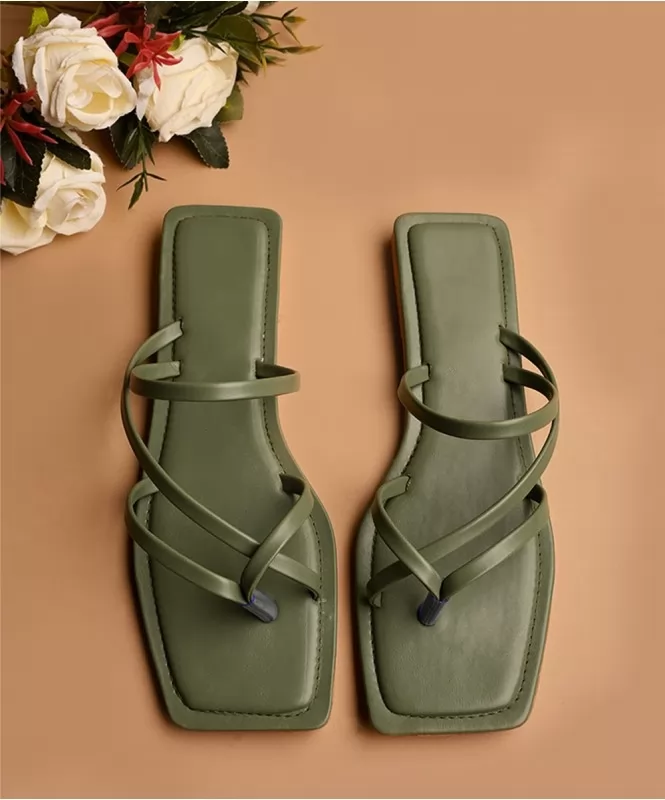 The sage green strappy flats 