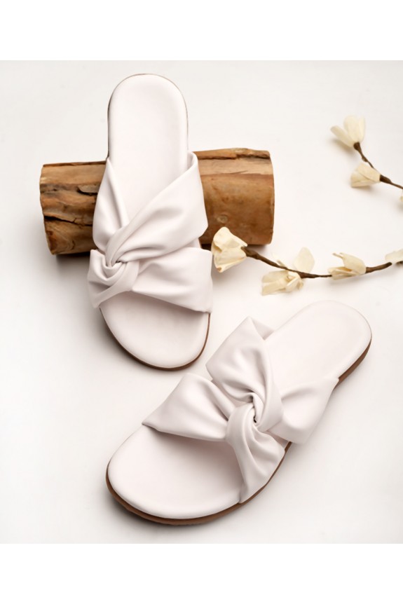 White twisted strap flats