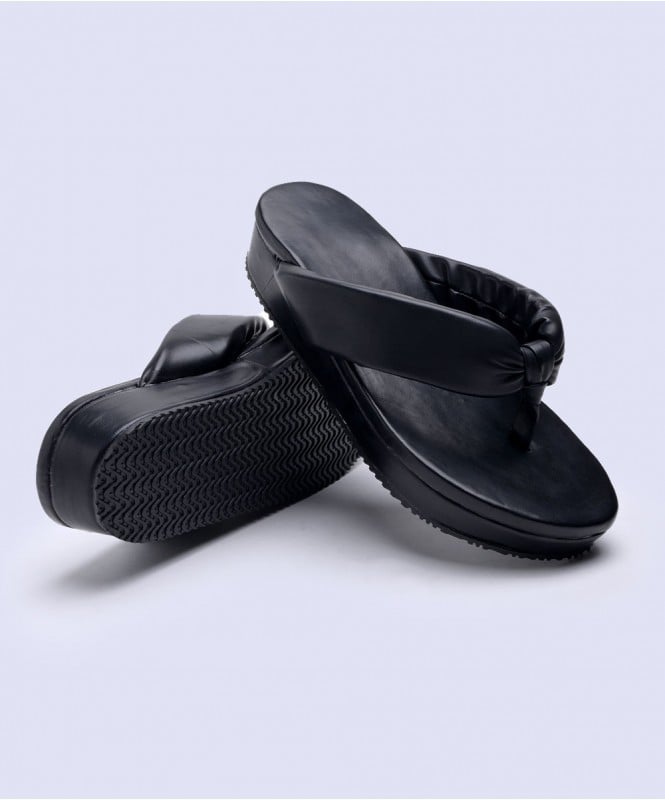 Black quilted strap flatforms