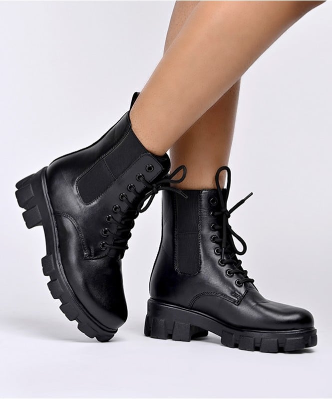 The black chelsea combat boots 