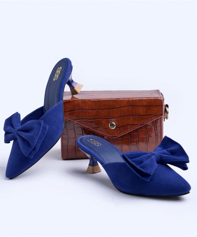 Blue suede bow heels 