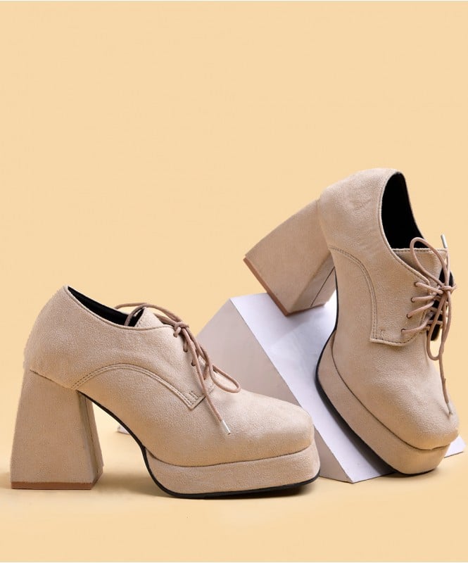 The beige suede platform shoes