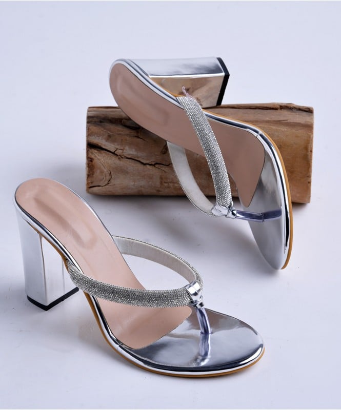 The shiny silver heels