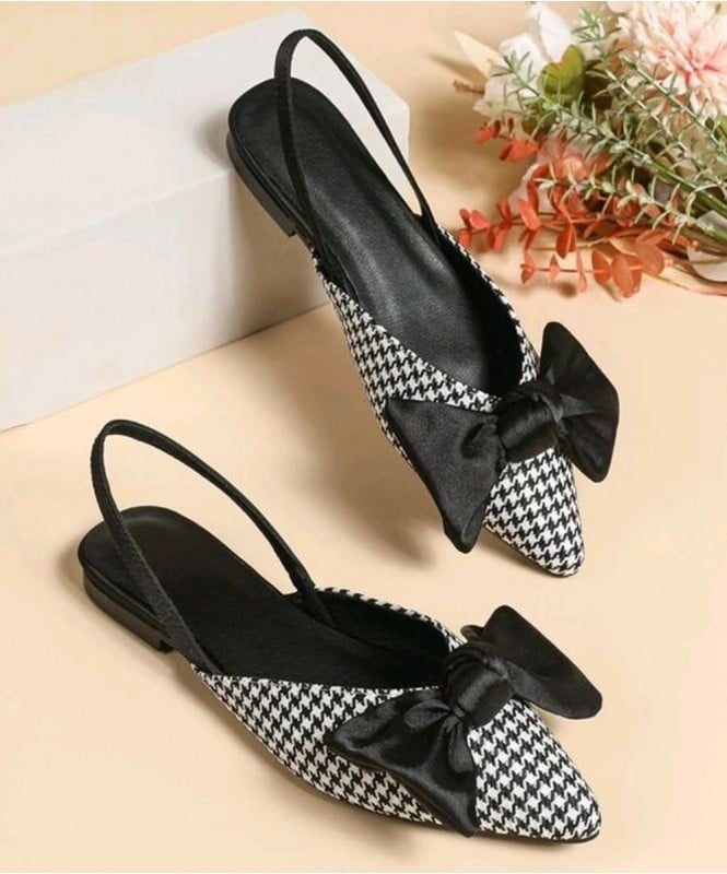 Black checkered bow mules 