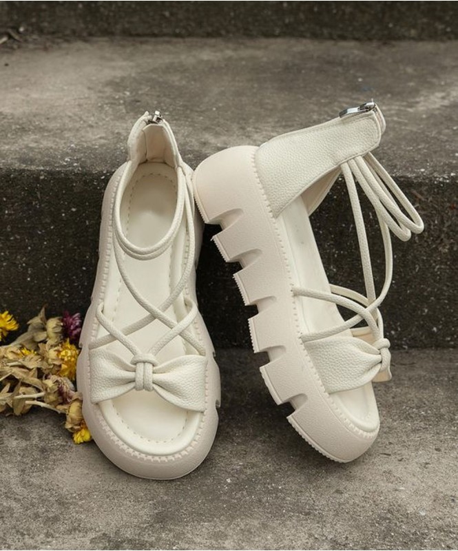 White strappy bow sandals 
